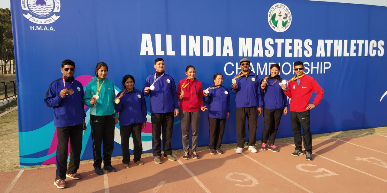 Uttarakhand masters athletes displaying medals